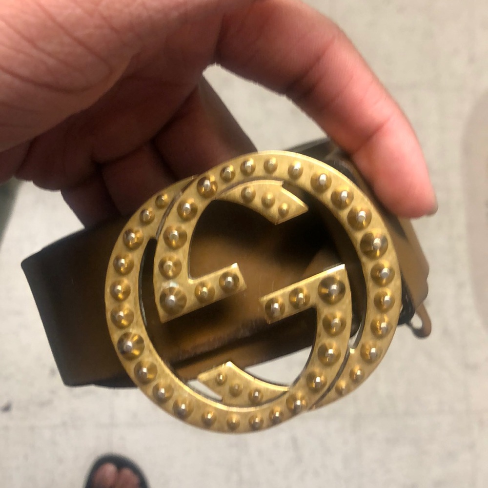 Spike metal buckle Gucci belt